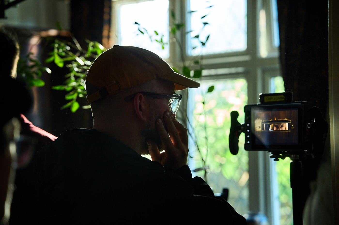James Newman on set, monitoring a shot